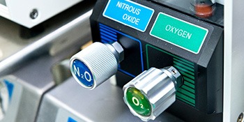 Nitrous oxide and oxygen knobs on medical machine